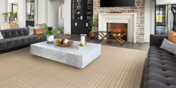 Custom beige plaid rug in living room 