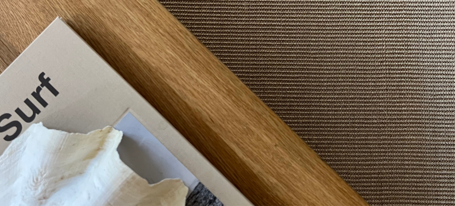 Sisal Rug with coffee table and book 
